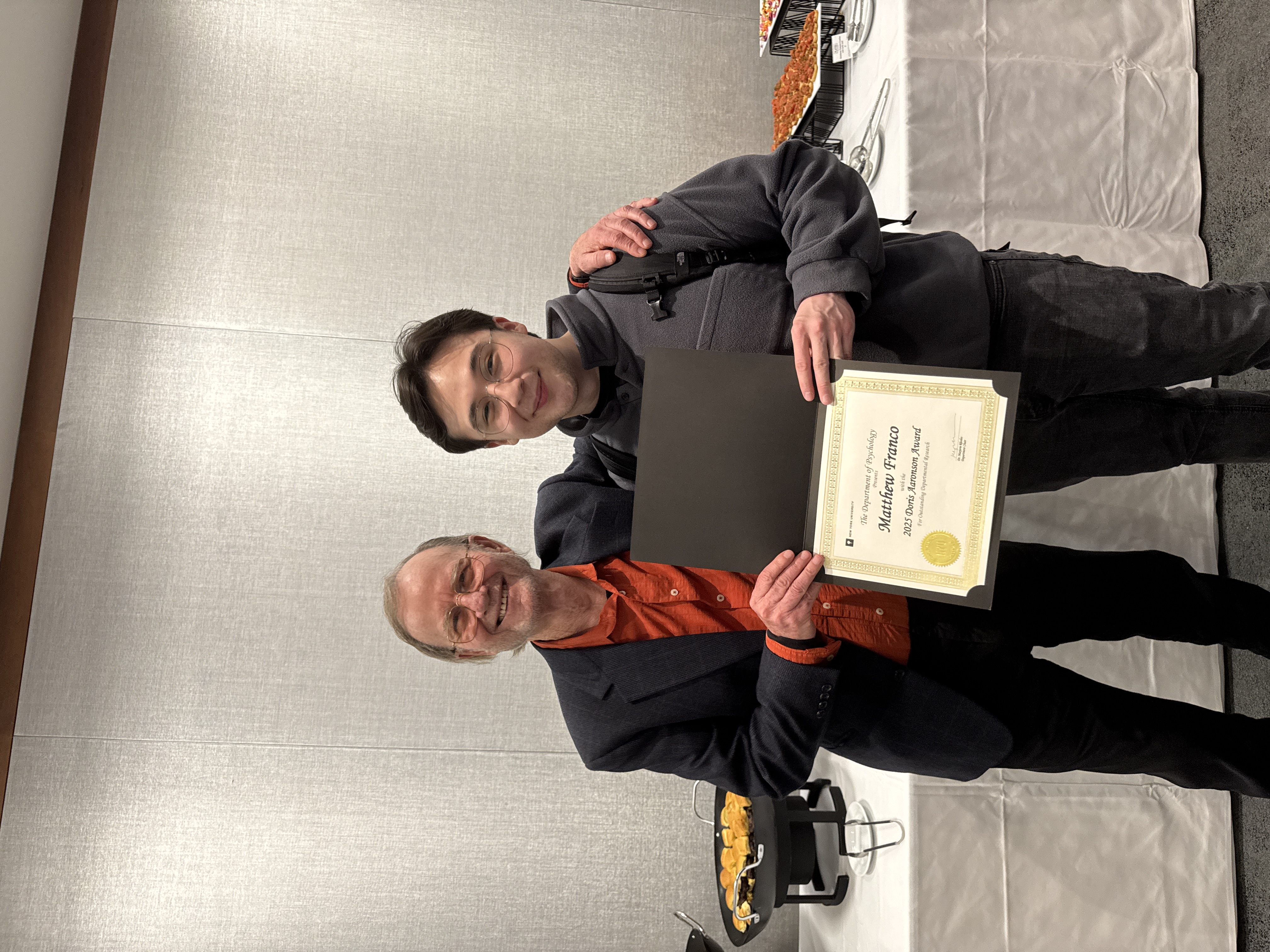 Receiving the department award for psychology at NYU